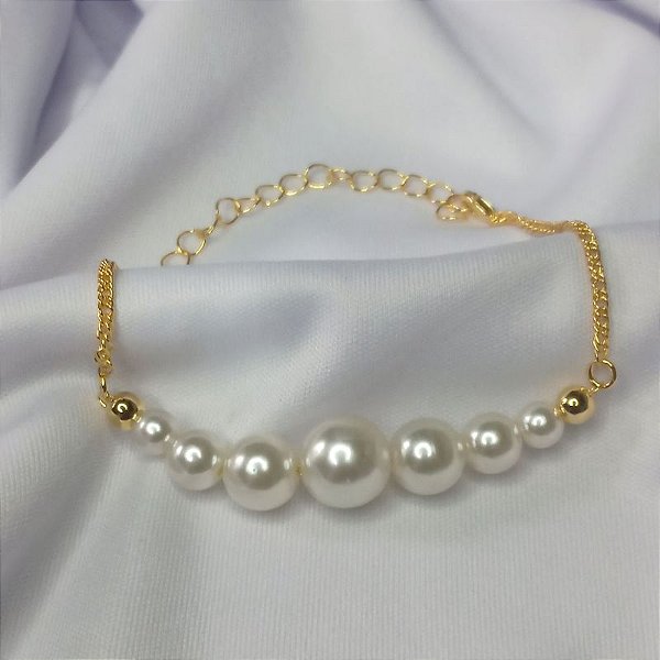 Pulseira c/ 7 pérolas e 2 bolinhas - Ouro 18K