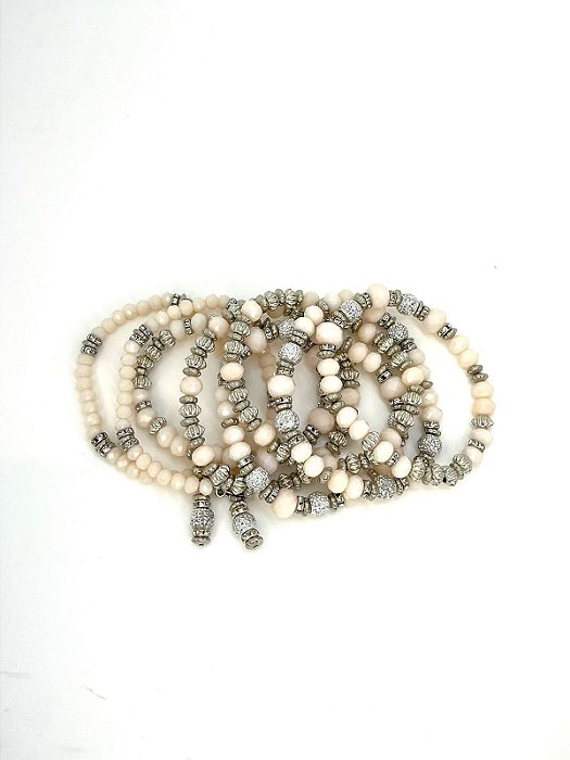 Pulseira 8v. de cristais nude e abs niquel