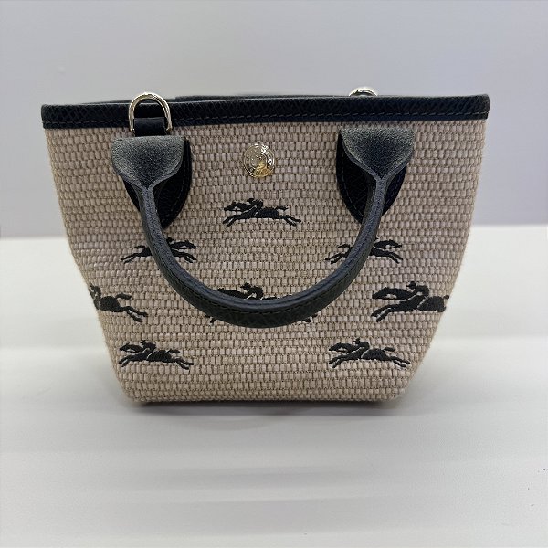 Bolsa longchamp verde com palha