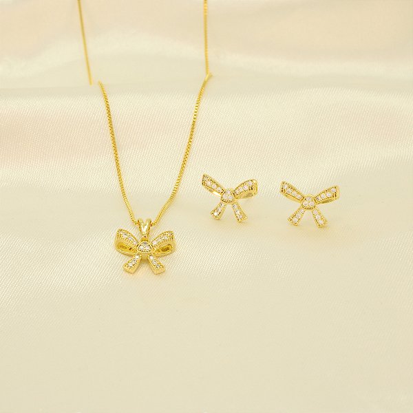 Conjunto de Laço Cravejado em Zircônia e Banhado a Ouro 18k