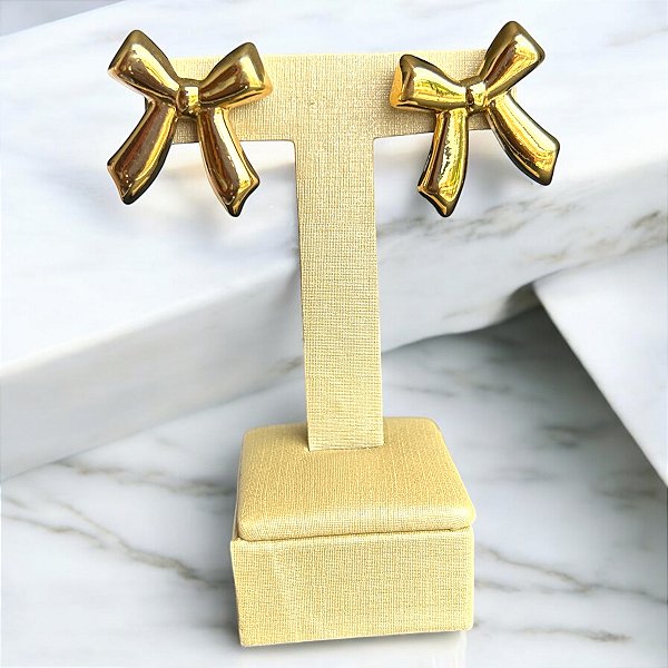 Brinco laço dourado