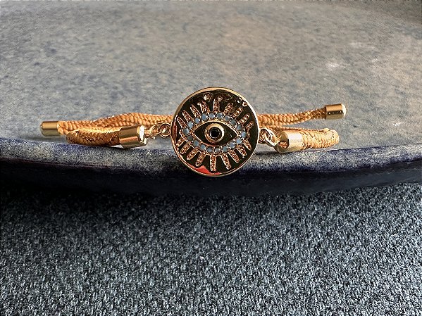 Pulseira Cordão Bege com Olho Grego Dourado