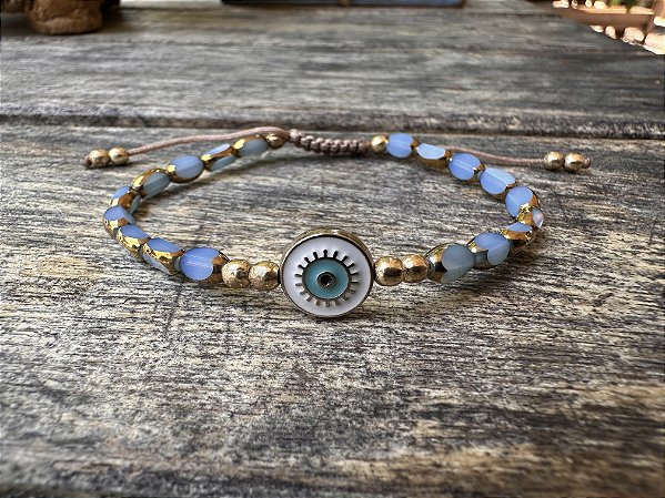 Pulseira Cristais Facetados Azul com Olho Grego