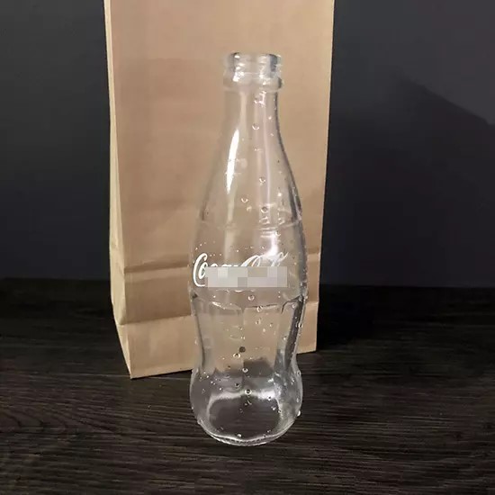 Vanishing Coca-Cola Bottle