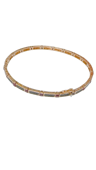 Pulseira em ouro amarelo com rubis e diamantes negros