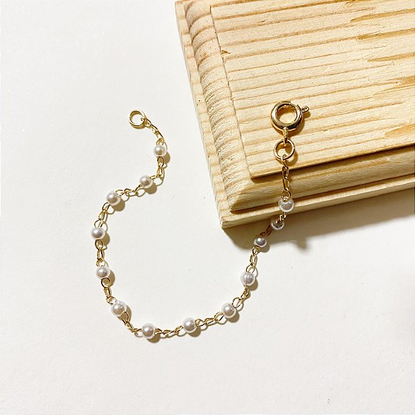 Pulseira em pérolas