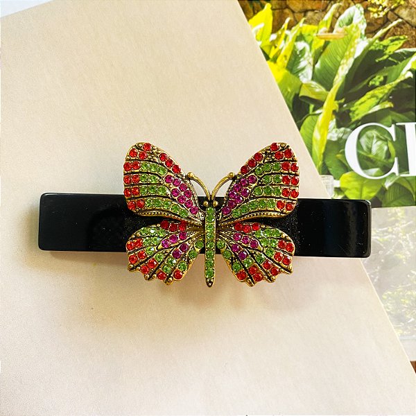 Presilha bico de pato borboleta em strass