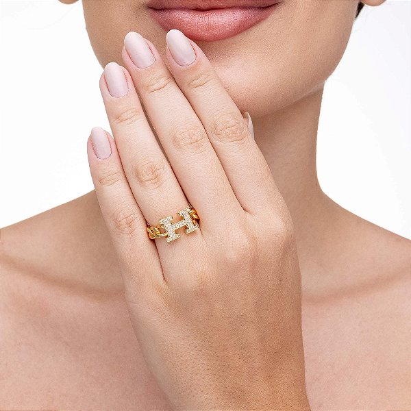 Anel H Cravejado Regulável com metal trançado no banho de Ouro 18K