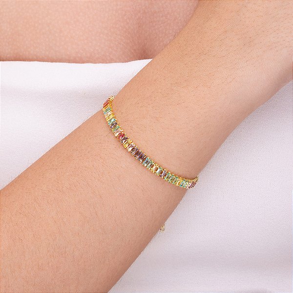 Pulseira rivieira em baguete com zircônia Candy folheada a ouro