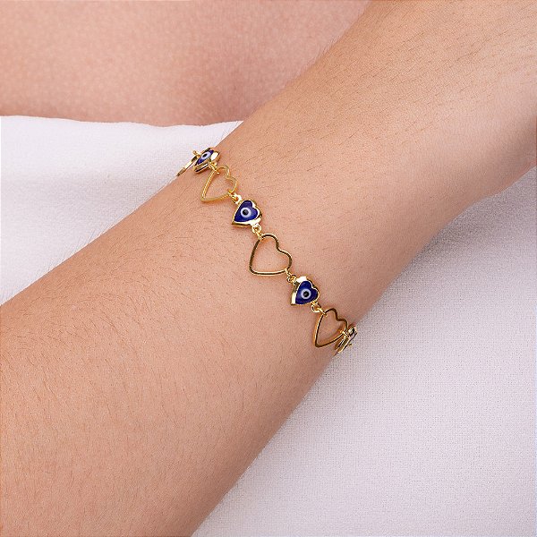 Pulseira de coração vazado com olho grego azul bic folheado a ouro