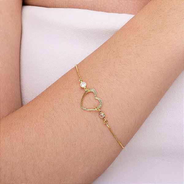 Pulseira de coração vazado com dois ponto de luz e corrente veneziana folheada a ouro