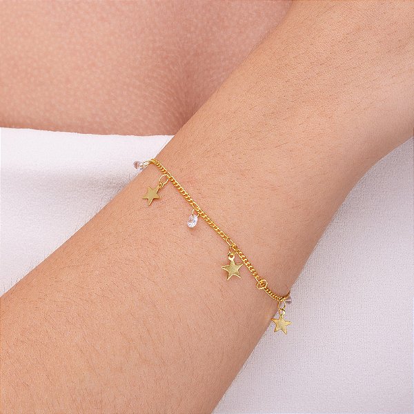 Pulseira estrela com ponto de luz folheada a  ouro