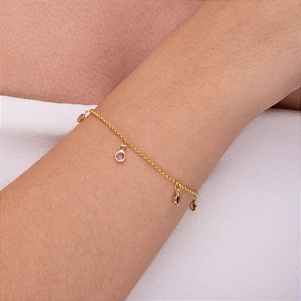 Pulseira com pedra redonda lilás folheado a ouro