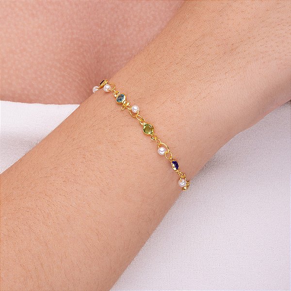 Pulseira com pérola e pedrinhas coloridas intercaladas folheada a ouro