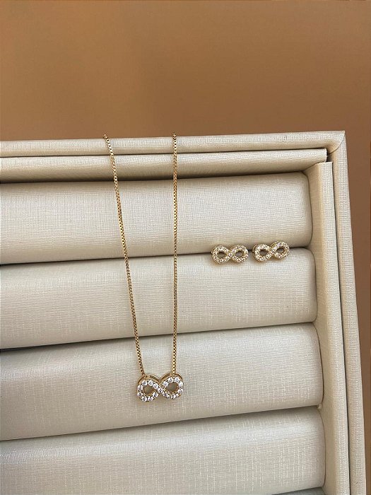 CONJUNTO SIMBOLO INFINITO CRAVEJADO OURO