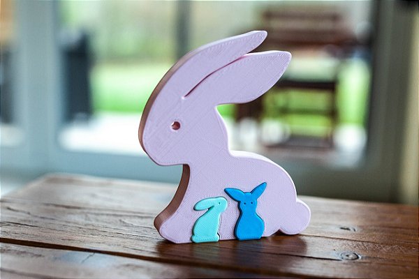 Coelho com "Filhotes": Uma Adorável Interação para sua Decoração de Páscoa