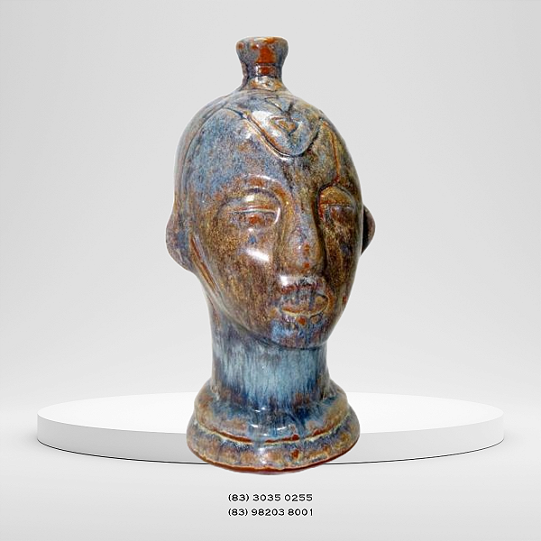 Saul Santana: escultura cabeça em cerâmica vitrificada