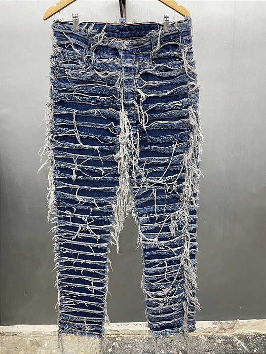Distressed dark blue denim