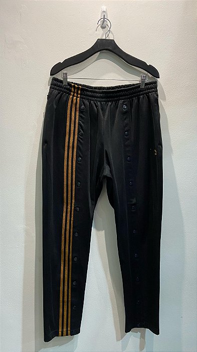 CALÇA ADIDAS IVY PARK TRACK MESA GOLD