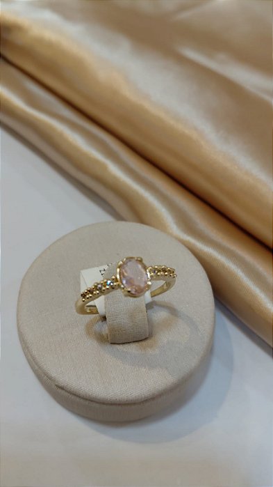 ANEL PEDRA OVAL ZIRC ROSA E CRAVEJ LATERL ZIRC CRI