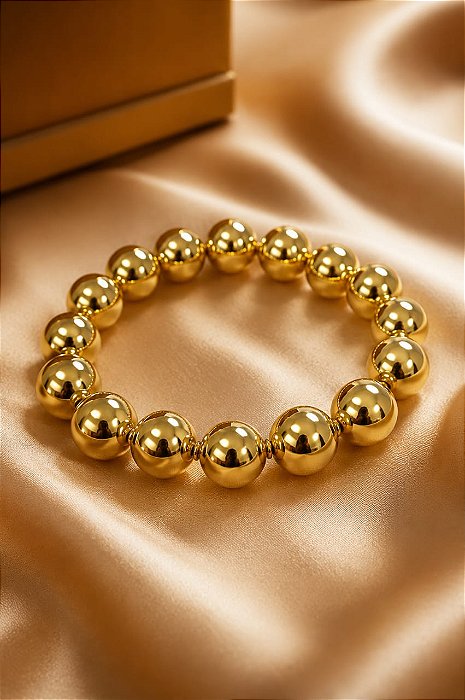 PULSEIRA ELASTICA COM ESFERAS UNIDADE 18K