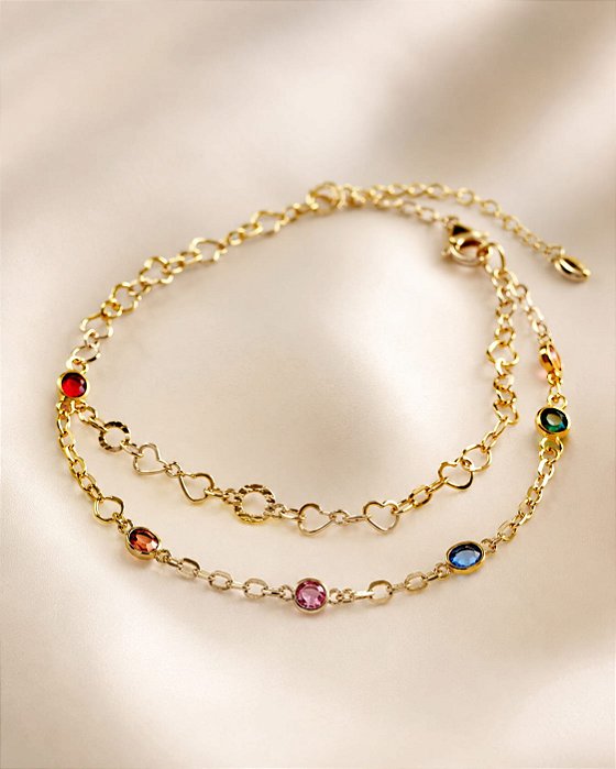 PULSEIRA ELOS CORAÇÃO E PEDRAS COLOR PONTO LUZ