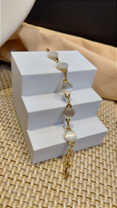PULSEIRA LUXO CÍRCULOS COM PEDRA OLHO DE GATO