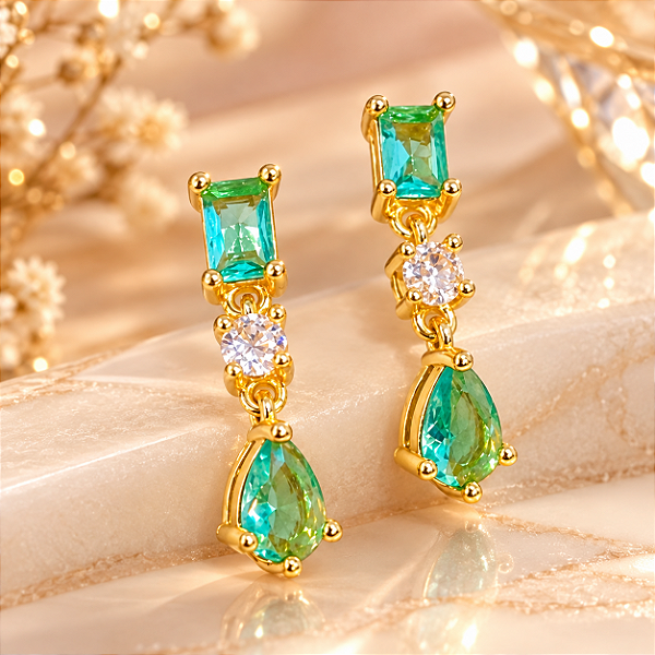 BRINCO PENDENTE COM ZIRCÔNIAS VERDE