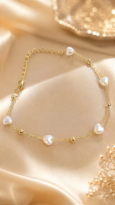 PULSEIRA BOLINHAS C/CORAÇÕES EM PÉROLA