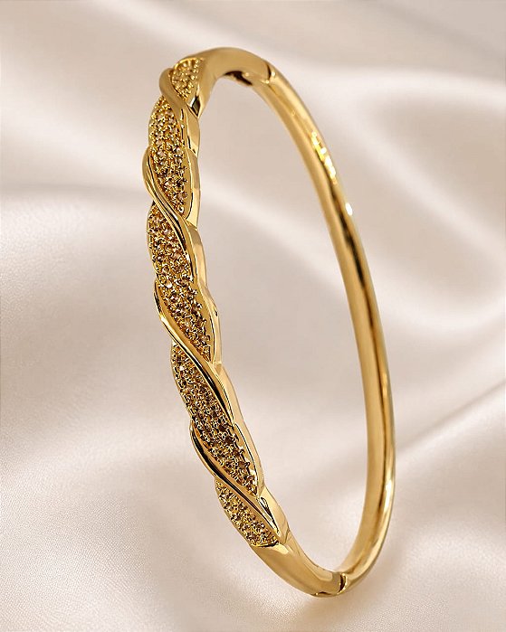 BRACELETE C/ DETALHE TORCIDO CRAVEJADO DE ZIRCONIA