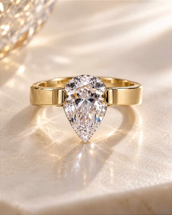 ANEL GOTA ZIRCONIA AÇO DOURADO