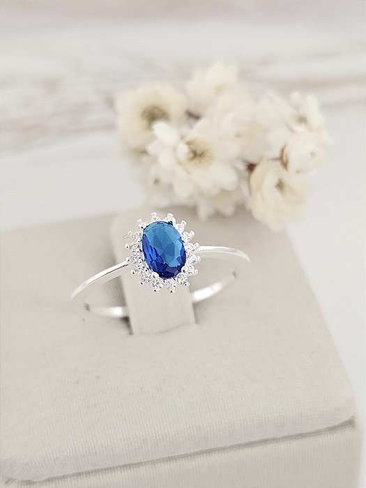 Anel solitário oval cravejado prata 925/ cor safira