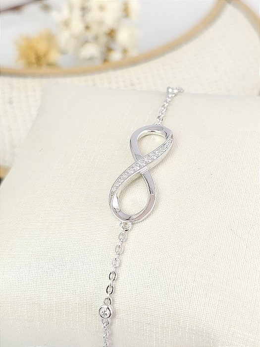 Pulseira Infinito cravejada Moissanite prata 925 com banho de ródio