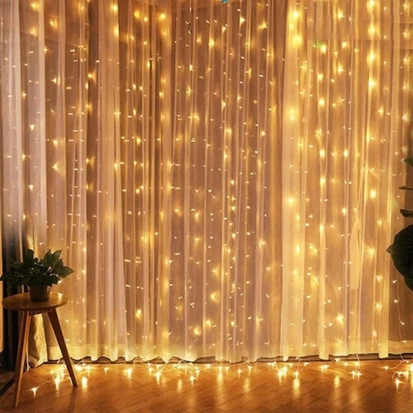 Cortina com 360 LEDs Branco Quente 8 funções fio de Fada PVC 3m x 3m bivolt.