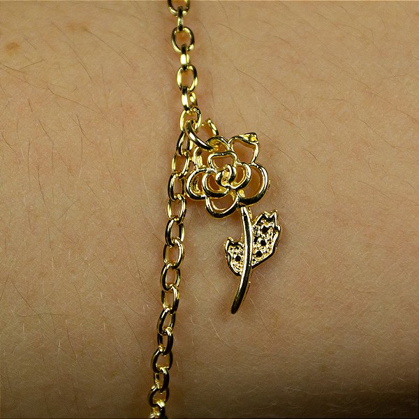 Pulseira dourada pingente flor