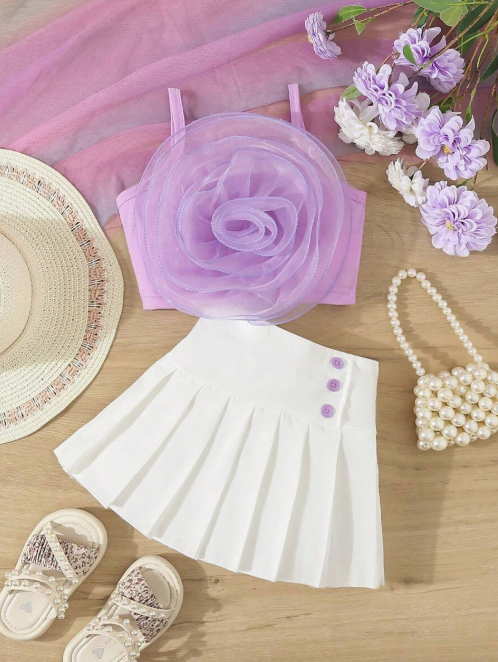 conjunto com flor e saia plisada premium