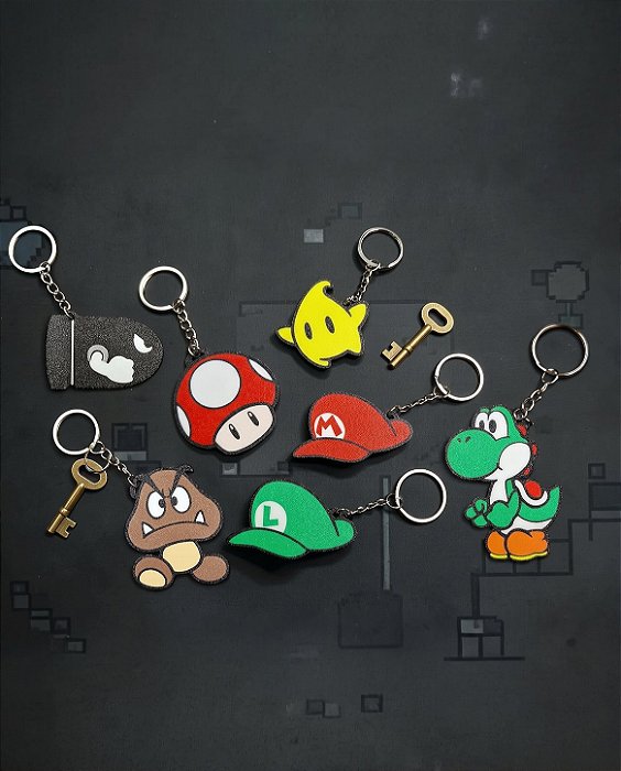 Chaveiros 3D Coleção Super Mario Bros – Yoshi, Cogumelo, Goomba e Bonés