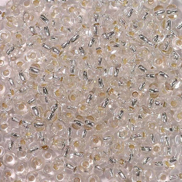 Miçanga Jablonex Transparente com miolo prata 6/0