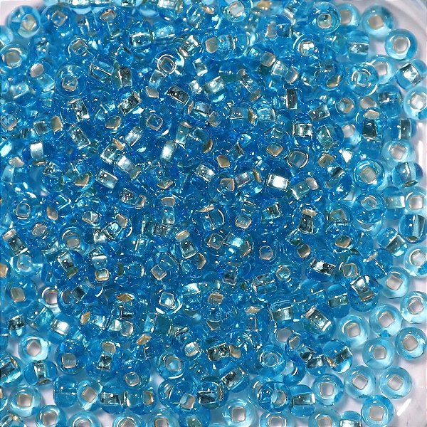 Miçanga Jablonex Azul Transparente com miolo prata 6/0