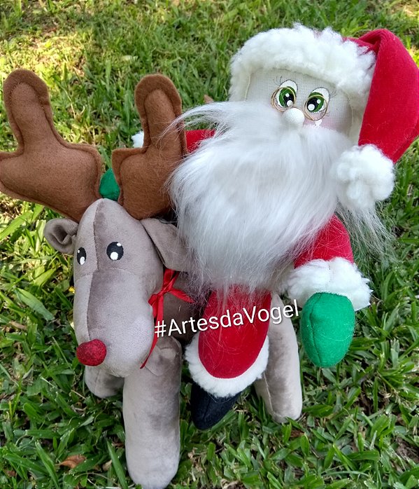 Papai Noel montado na Rena