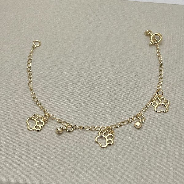 Pulseira patas de cachorro em banho de ouro 18k