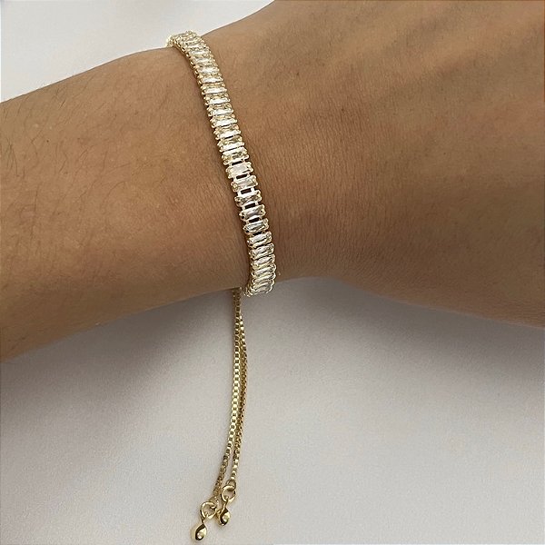 Pulseira Riviera baguete fecho gravata em banho de ouro 18k