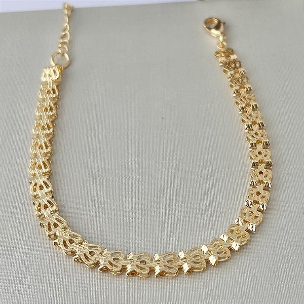 Pulseira de coroas vazadas em banho de ouro 18k