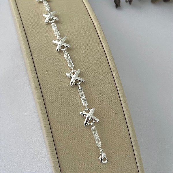 Pulseira em zircônias navete e X lisos em banho de prata silver