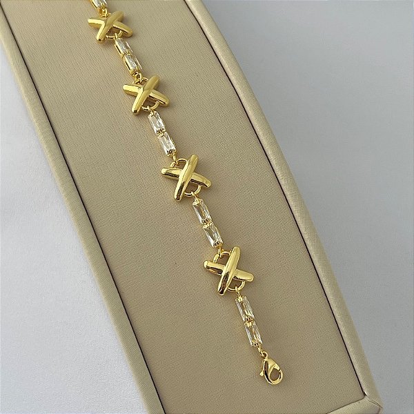 Pulseira em zircônias navete e X lisos em banho de ouro 18k