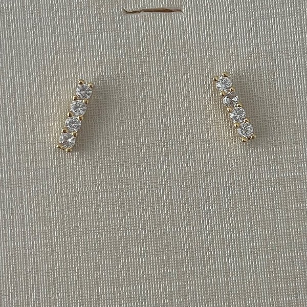 Brinco tubo cravejado em banho de ouro 18k