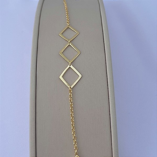 Pulseira de retângulos vazados em banho de ouro 18k