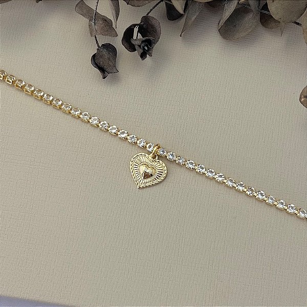Pulseira riviera com pingente de coração em banho de ouro 18k