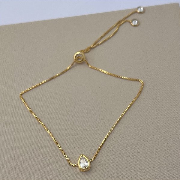 Pulseira gota com fecho gravata em banho de ouro 18k