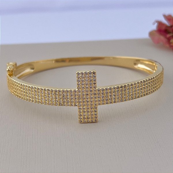 Bracelete cravejado de cruz em banho de ouro 18k